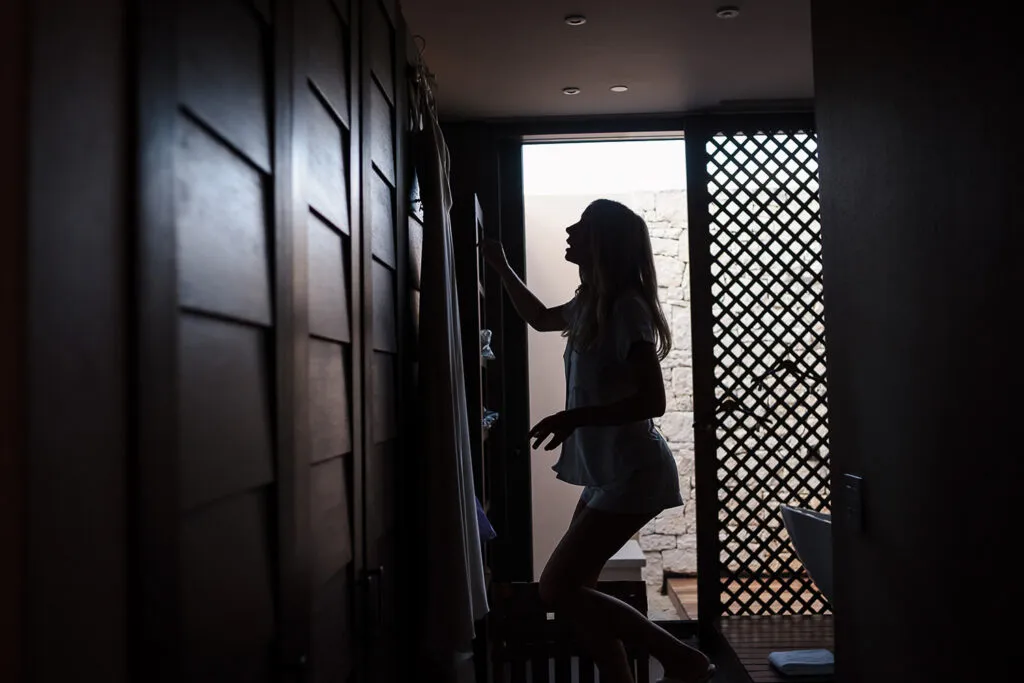 Bride silhouette on stairs during wedding preparation in Cancun Riviera Maya destination wedding photography session