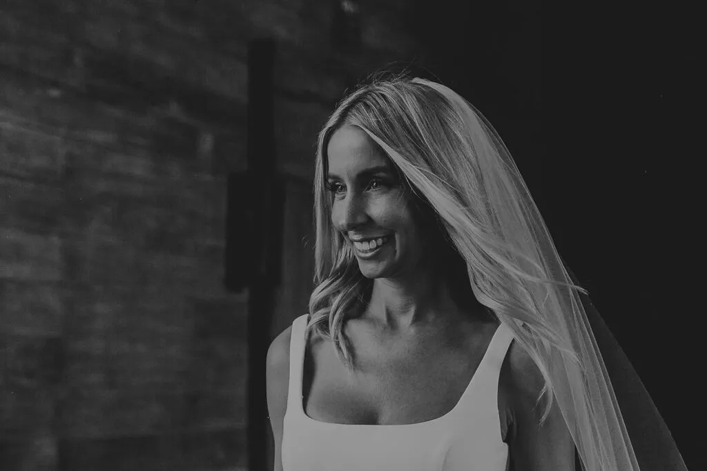 Bride smiling in elegant wedding dress with veil in Cancun Riviera Maya Mexico destination wedding photography