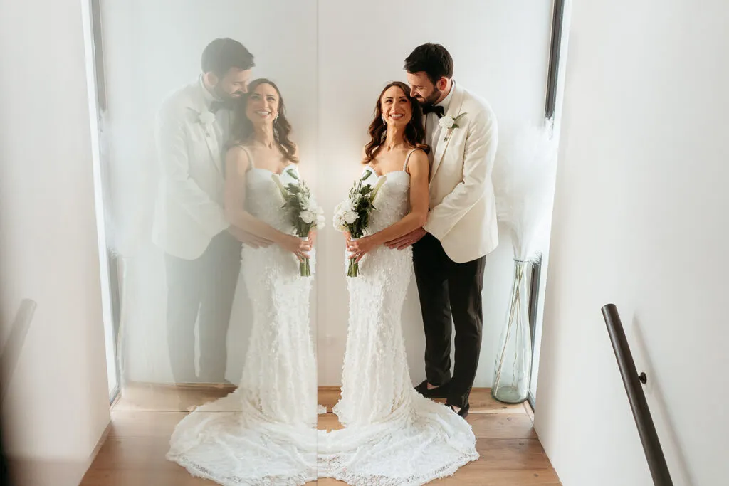 Bride and groom wedding portrait in Cancun Mexico with romantic mirror reflection at Riviera Maya resort venue