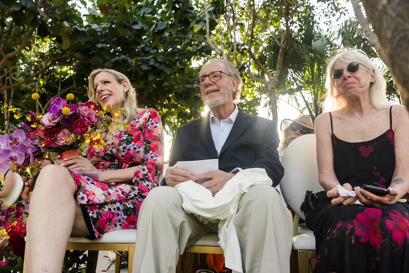 LGBTQ wedding ceremony at Rosewood Mayakoba with same-sex couple and guests celebrating in tropical Riviera Maya setting