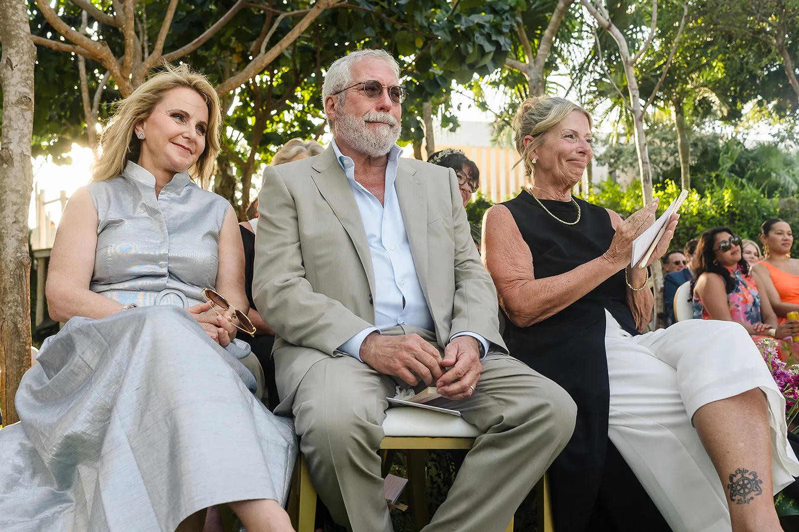 LGBTQ wedding guests at Rosewood Mayakoba celebrating same-sex couples photography in Riviera Maya Mexico destination wedding