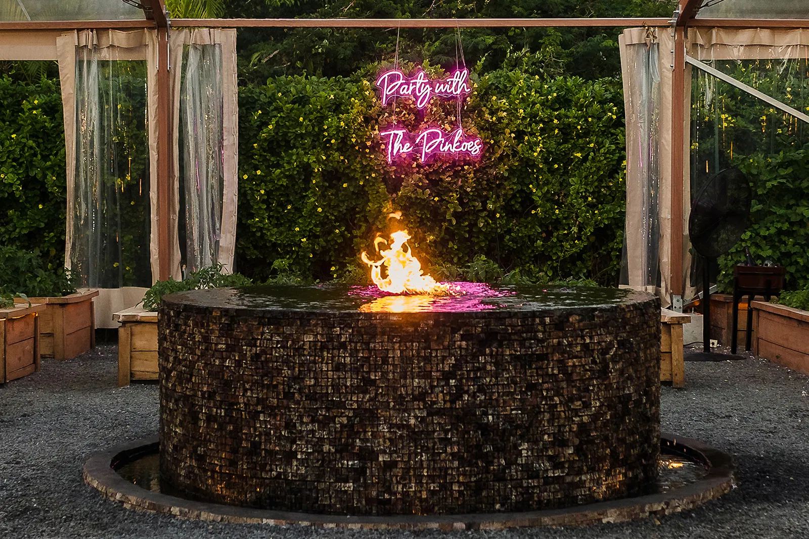 LGBTQ wedding fire pit celebration at Rosewood Mayakoba with neon sign - same sex couples photography Riviera Maya Mexico