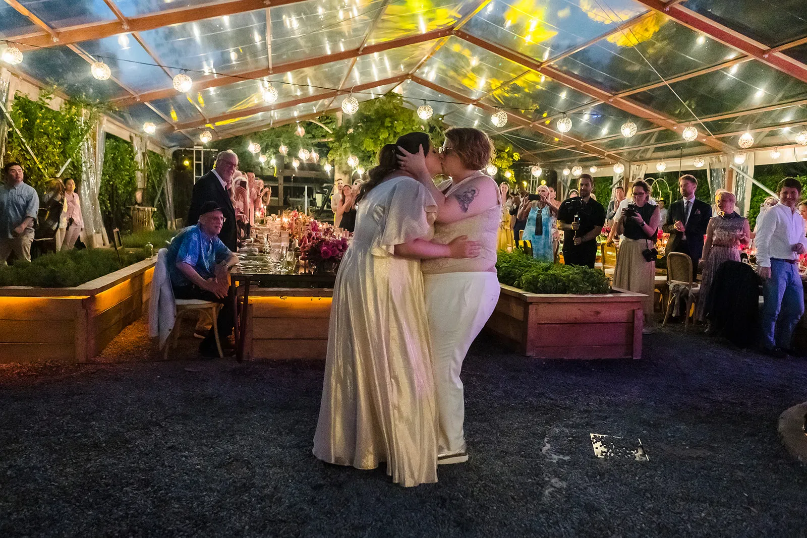 Gay wedding first dance at Rosewood Mayakoba under string lights, LGBTQ couples photography Cancun Riviera Maya Mexico